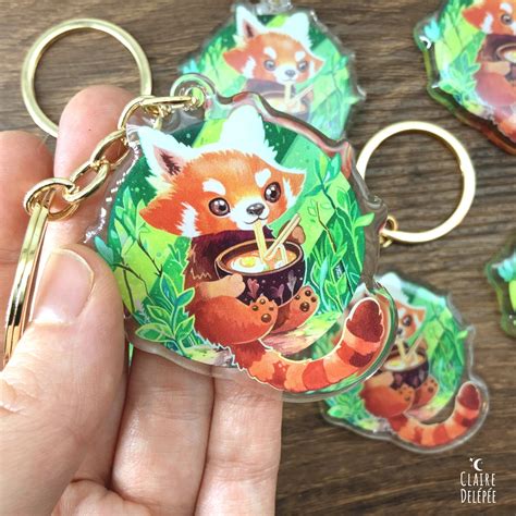 Red Panda Kawaii Keychain A Red Panda Acrylic Charm Eating Etsy