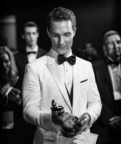 Matthew McConaughey holding the Best Actor Oscar at the 86th Academy ...