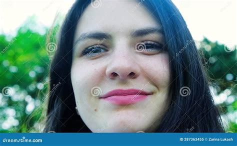 A Year Old Brunette Woman Turns Her Face To The Camera And Smiles Stock Video Video Of