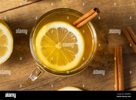 Boozy Warm Holiday Hot Toddy Cocktail With Rum And Lemon Stock Photo Alamy