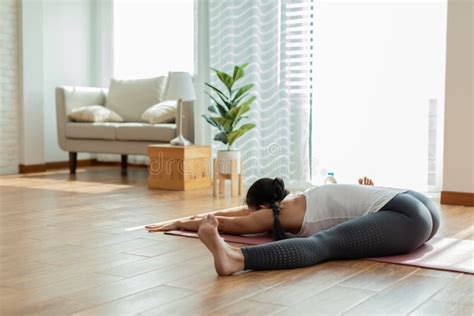 Calm Of Attractive Asian Woman Practice Yoga Boat Pose Or Navasana Pose