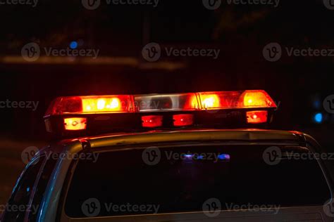 Police car lights at night 1978891 Stock Photo at Vecteezy