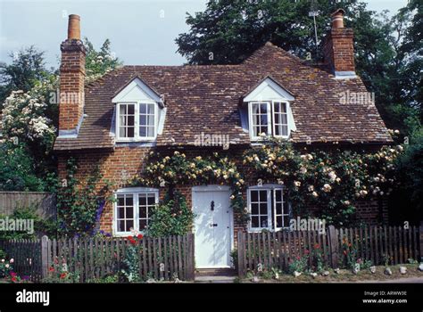 Traditional Brick Country Cottage With Dormer Windows Tile Roof And