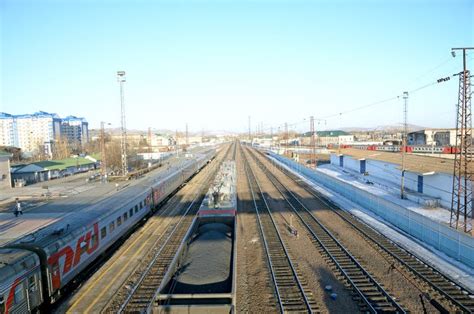 Russian Passenger and Freight Train at the Railway Station. Editorial ...