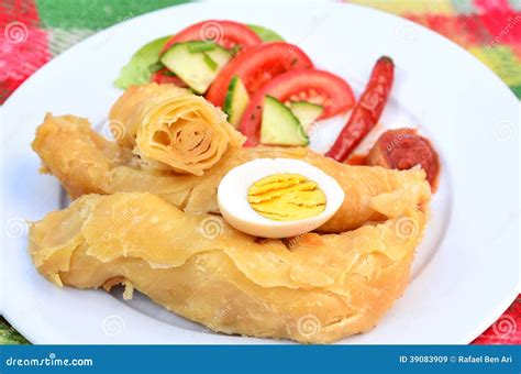 Yemeni Food - Jachnun stock image. Image of dish, boiled - 39083909