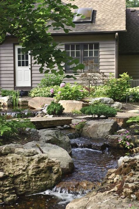 23 Awesome Artificial River Ideas For Your Garden Homemydesign