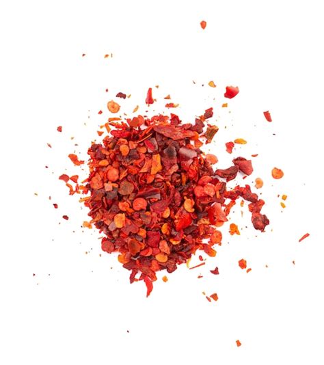 Premium Photo Dried Red Chili Flakes With Seeds Isolated On White