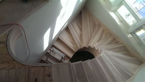 An Overhead View Of A Spiral Staircase In A House