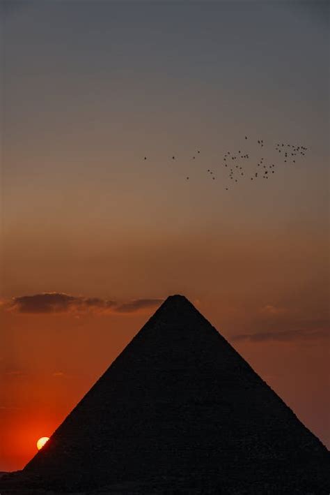 Silhouette of Pyramid During Sunset · Free Stock Photo