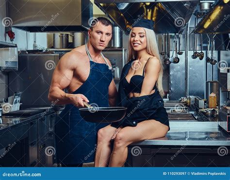 A Waitress Flirts With An Attractive Cook Stock Image Image Of