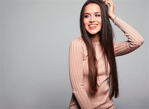 Free Photo Beautiful Cute Brunette Model In Casual Beige Warm Sweater