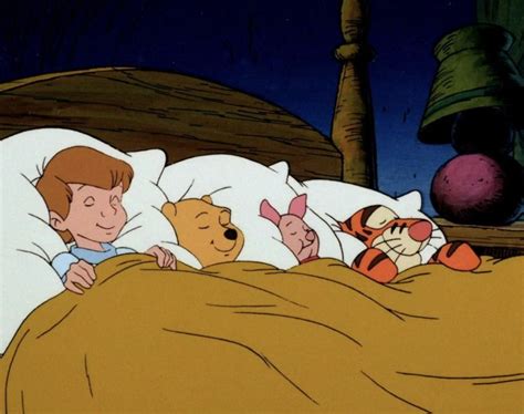 An Animated Image Of Winnie The Pooh And Tigger Sleeping In Bed With