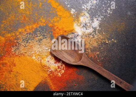 Indian Woman Hand Powdering Indian Spices Coriander Powder In Stone