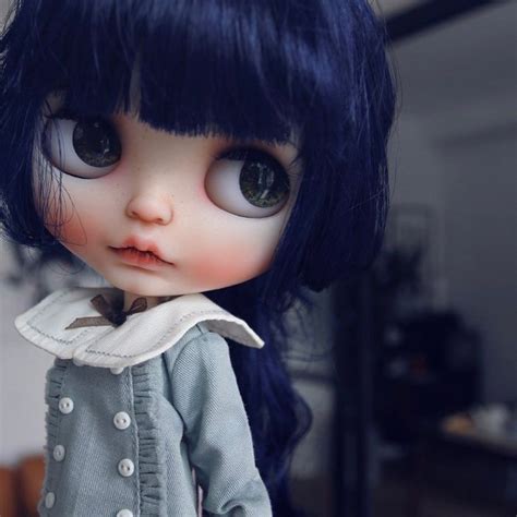 Close Up Of Curly Blue Babe Doll