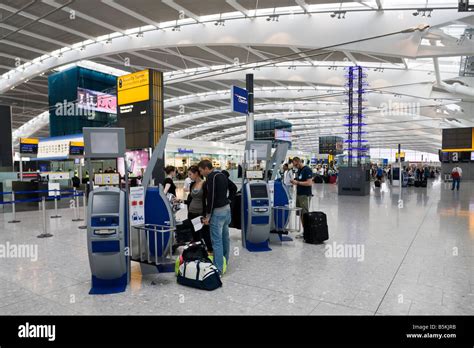 self check in, departure level, Terminal 5, Heathrow, London, England Stock Photo - Alamy