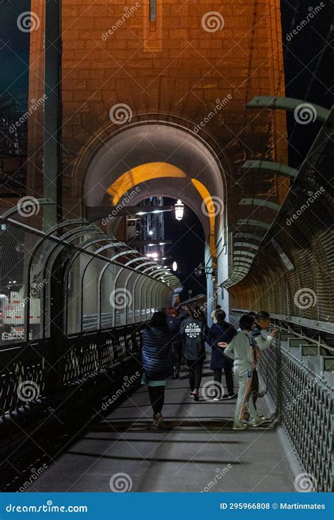 Walking on the Sydney Harbour Bridge at Night with Other Visitors ...