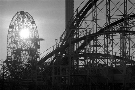 sun setting    wheel coney island coney  flickr