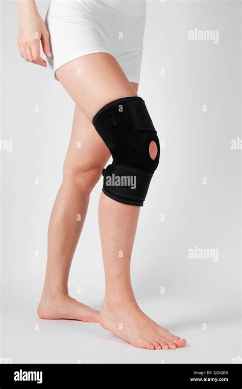 Knee Support Brace On Leg Isolated On White Background Elastic