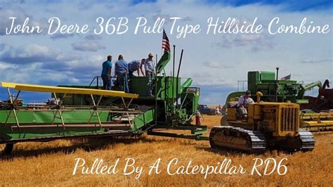 John Deere 36B Pull Type Combine Pulled By A Caterpillar RD6 YouTube