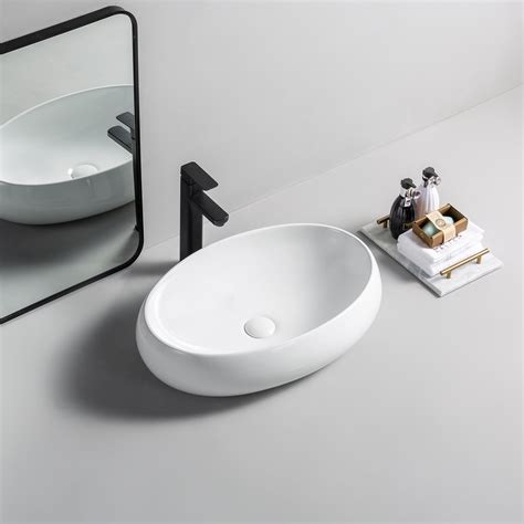 China Sanitary Ware Suppliers Oval Wash Hand Basin Hotel Bathroom