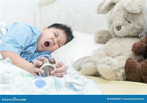 Cute Boy Wakes Up And Yawning Stock Photo Image Of Abdomen Adorable