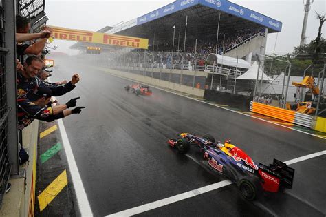 1024x768 Resolution F1 Cars On Road At Daytime Formula 1 Red Bull