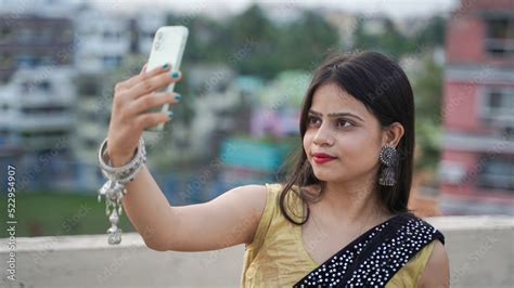 Beautiful Indian Girl Taking Selfie On Her Mobile Phone Outdoor