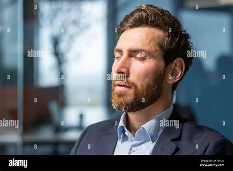 Close Up Businessman With Closed Eyes Dreaming And Breathing Fresh Clean Air Mature Boss In
