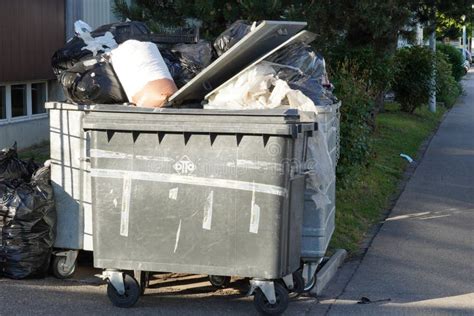 A Group of Waste Containers on Wheels. Stock Image - Image of garbage, industrial: 255304801