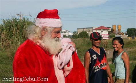 Santa Claus Spreading Cheer In The Philippines For Christmas During