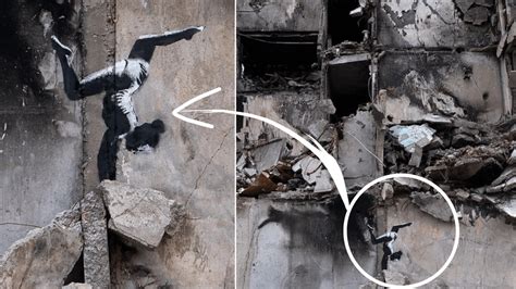 British street artist 'Banksy' creates mural art on destroyed buildings ...