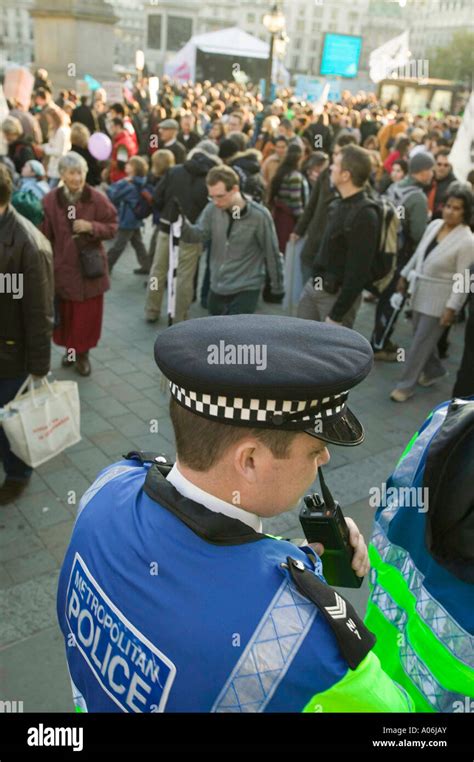 Policemen Policing A Climate Change Protest Rally In Trafalgar Square