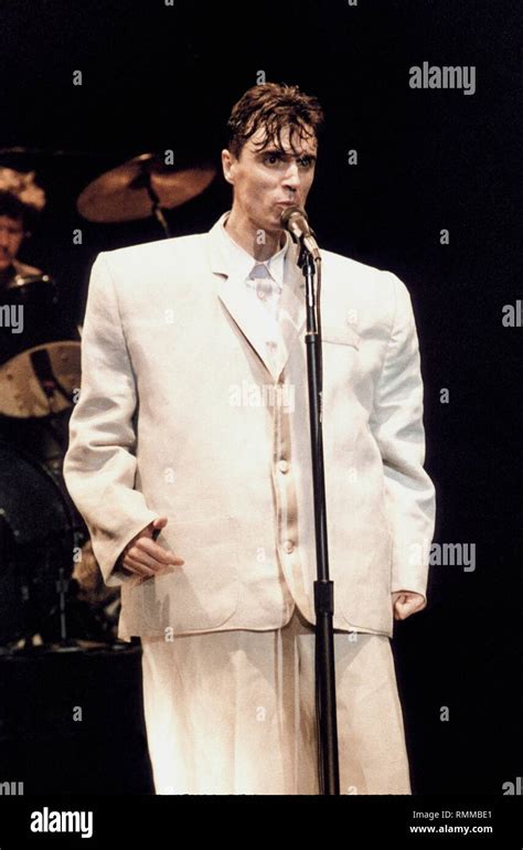 Singer Songwriter And Guitarist David Byrne Of Talking Heads Is Shown Wearing His Oversized