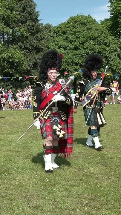 Drum Majors Lead Massed Pipes And Drums Opening March At 2023 Oldmeldrum