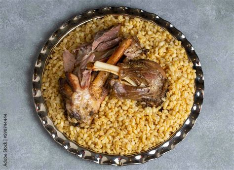 Turkish Foods Lamb Shank Tandoori On Bulgur Wheat Rice Turkish Name Bulgur Bugday Pilavi Kuzu