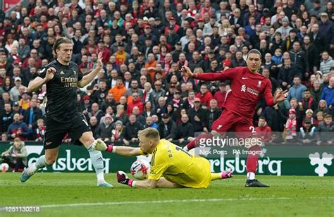 Arsenal goalkeeper Aaron Ramsdale saves from Liverpool's Darwin Nunez ...