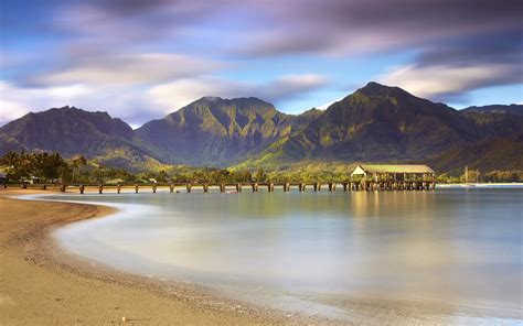 1680x1050 Pier Canopy Sea Beach Mountains Coast Day Wallpaper 