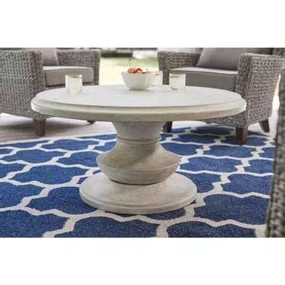 round stone coffee table outdoor - Alphonso Calderon