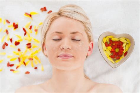 Pretty Blonde Woman Lying Down Near Flower Petals Stock Photos Free