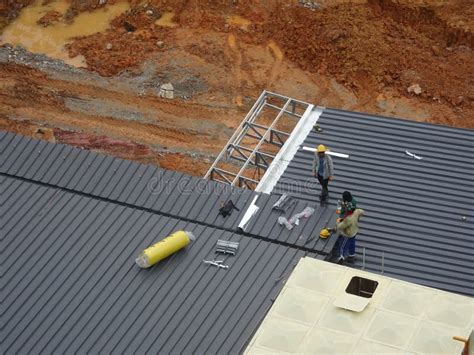 Installation of Metal Deck Roof Sheet by Construction Workers. Editorial Photo - Image of colour ...