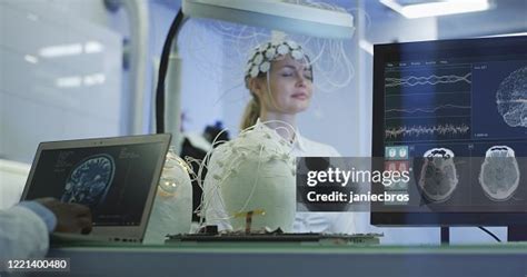 Man Scientist Examining Womans Brain By Brainwave Scanning Headset In ...