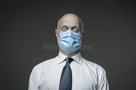 Worried Businessman Wearing A Surgical Mask Stock Image Image Of Fear