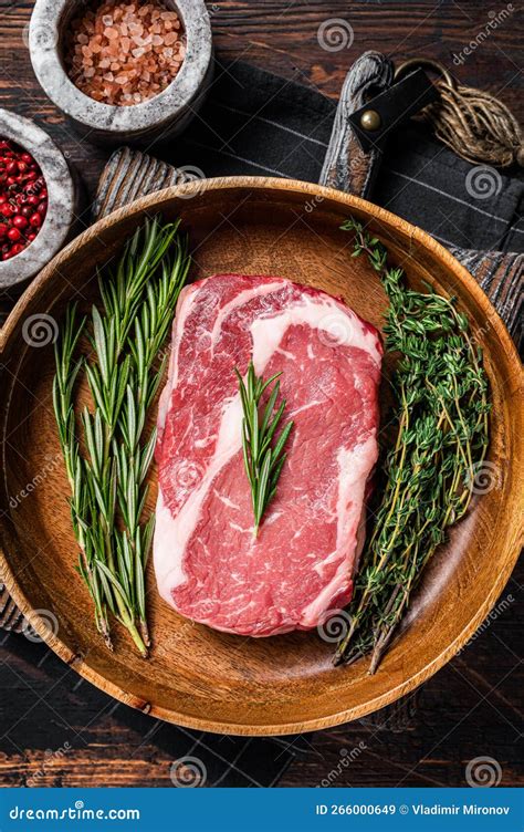 Rib Eye Raw Steak Rib Eye Beef Marbled Meat In Wooden Plate With