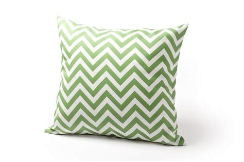 Premium AI Image | Green and white geometric patterned pillow isolated ...