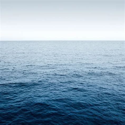 Blue sea with waves and clear blue sky — Stock Photo © korovin #22157213