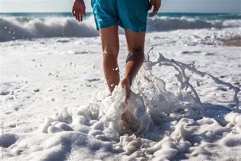 "Man Walking Barefoot At The Beach" by Stocksy Contributor "Jovo ...