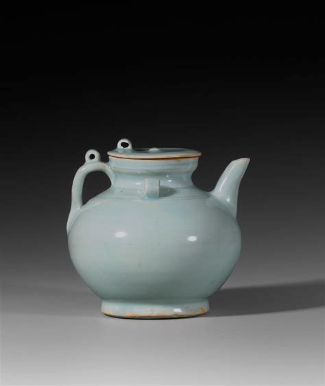 A QINGBAI GLAZED PORCELAIN EWER AND COVER J J Lally Co Oriental