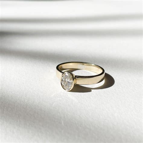 Via is a modern engagement ring, bold and minimal in design. This piece ...