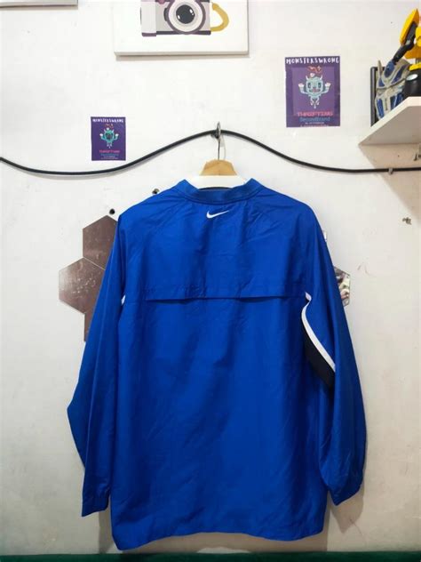 Kaos Lengan Panjang Parasut Nike Biru Garis Putih Small Logo Center