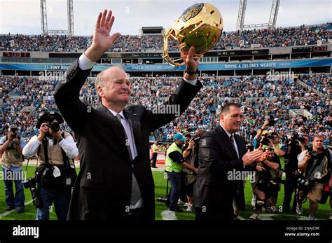 Jacksonville Jaguars Owner Wayne Weaver Waves To The Crowd After Being